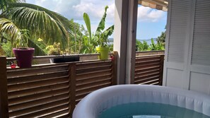 Outdoor spa tub - Charming F2 classified, air conditioning, sea view, spa, pool (Le Robert)
