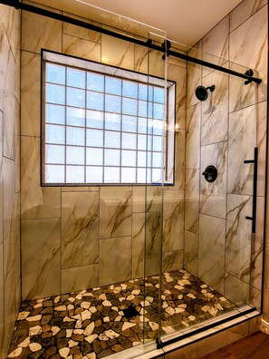 Combined shower/tub, hair dryer, towels, soap
