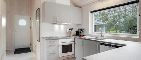 Fridge, dishwasher, coffee/tea maker