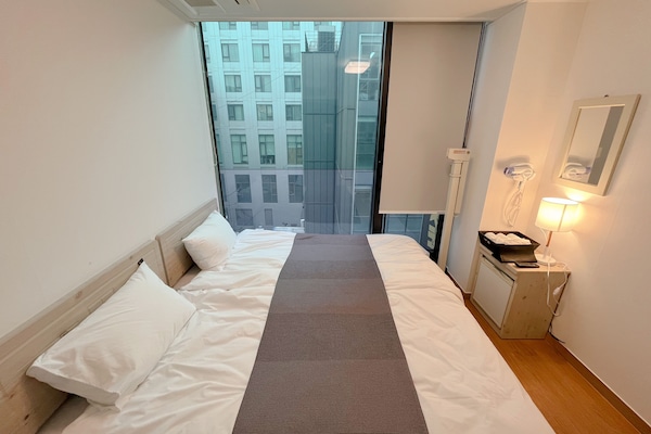 Economy Twin Room | Individually decorated, laptop workspace, blackout drapes, soundproofing