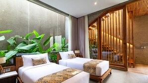 A modern hotel room with two beds, large windows, and a view of a wooden staircase. - Jiwoku Villas (Canggu)