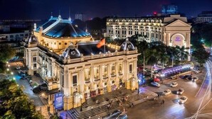 A historic building with classical architecture, a large central dome, and a flagpole. - Hanoi Fiesta Grand Hotel (Hanoi)