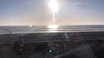 On the beach, sun-loungers