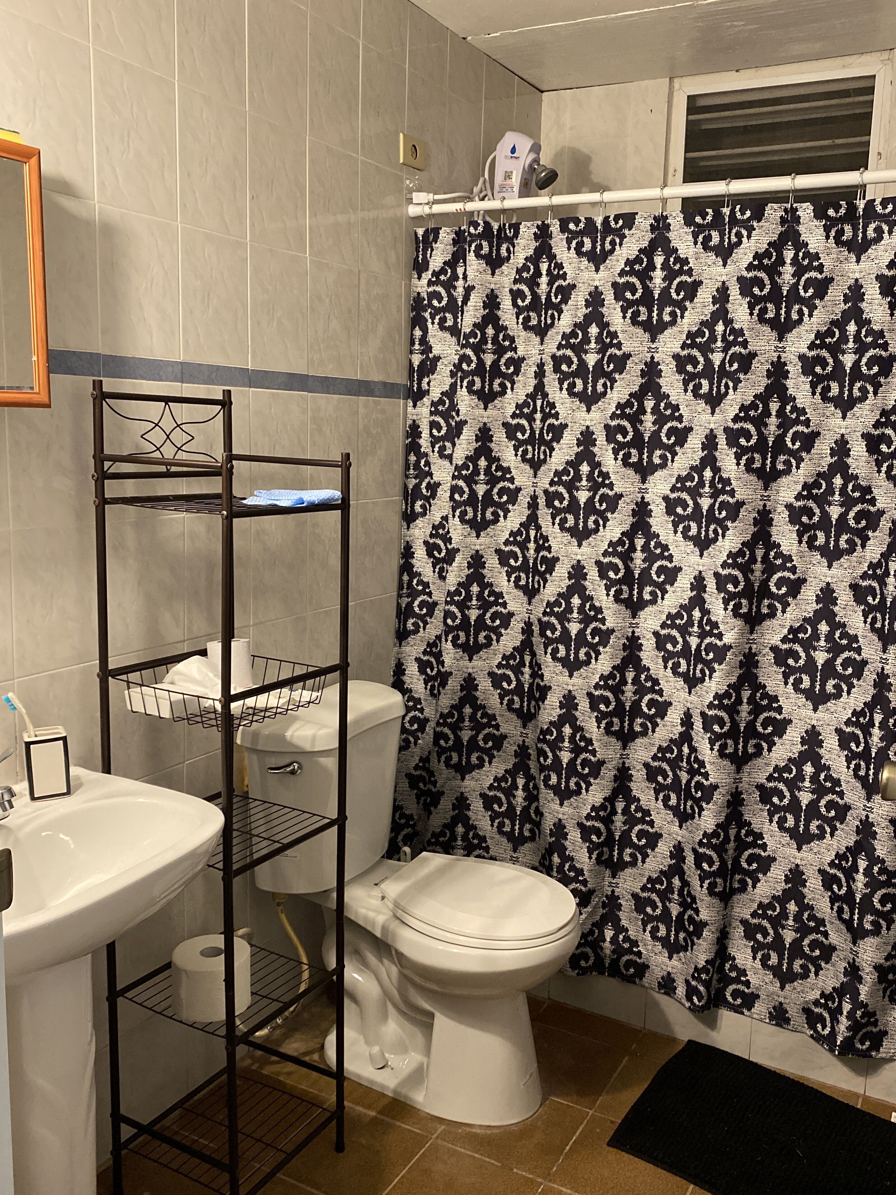 Shower, towels, soap, toilet paper