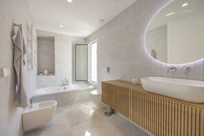 Bathtub, hair dryer, bidet