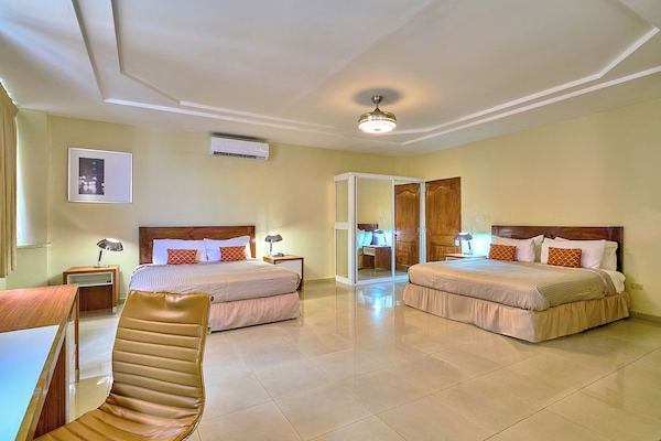 Grand Studio Suite | Minibar, in-room safe, desk, laptop workspace