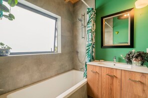 Bathtub, hair dryer, towels