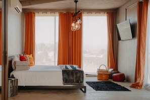 Kamar Deluks | Brankas, didekorasi berbeda-beda, Wi-Fi gratis, dan seprai linen