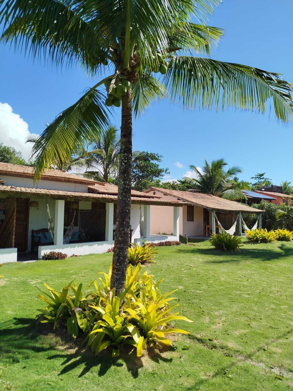 Quarto quádruplo premium, para não fumantes, vista para o mar | Vista para o jardim