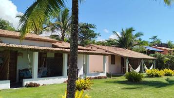 Quarto quádruplo premium, para não fumantes, vista para o mar | Vista para o jardim