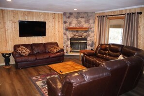 Älytelevisio, takka, kirjoja, stereot