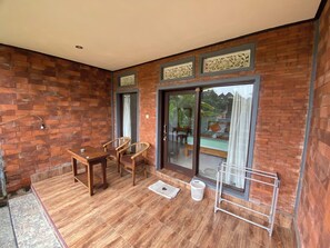 Habitación Deluxe doble | Terraza o patio