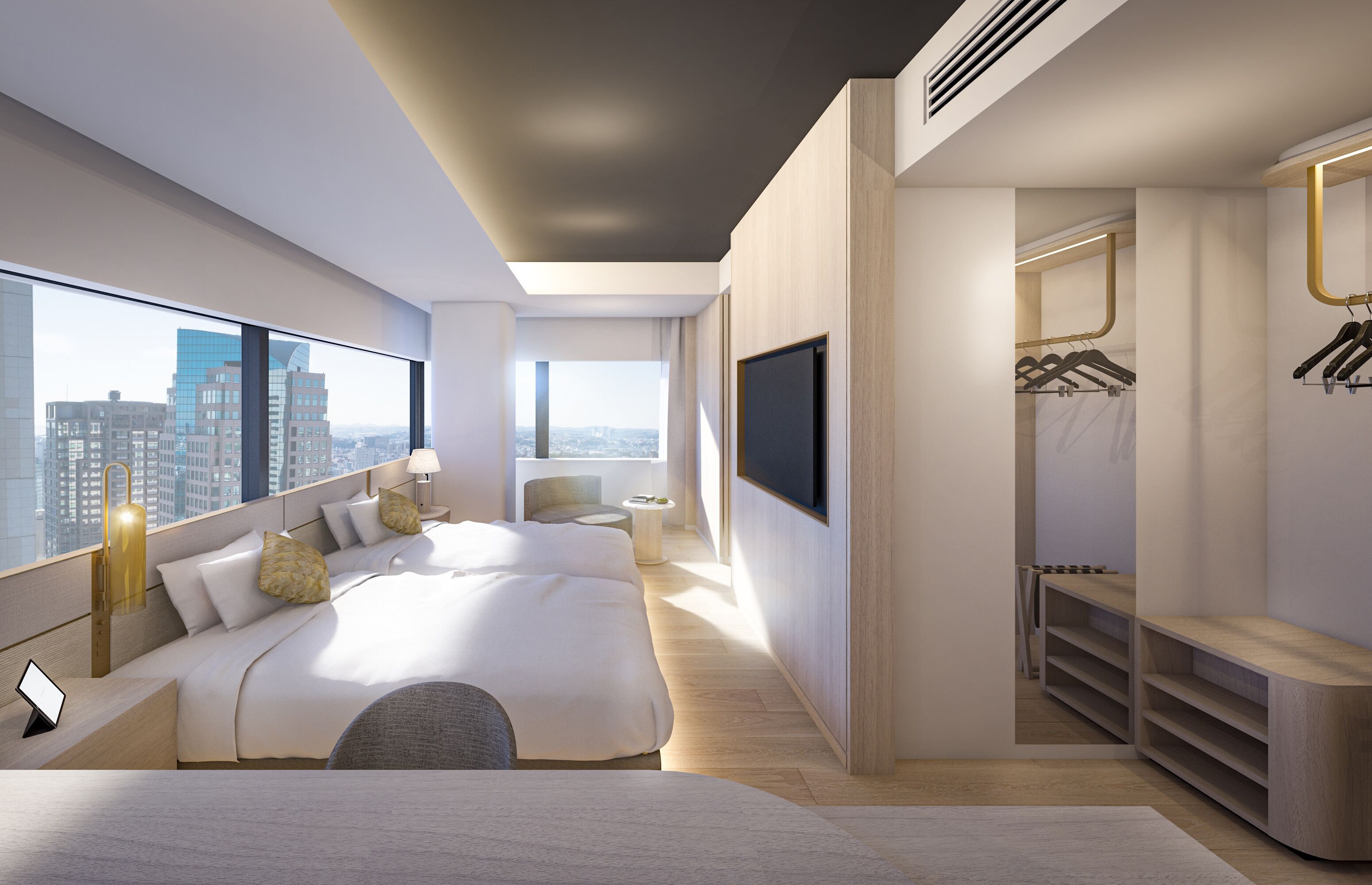 Una habitación de hotel moderna con una cama grande, televisión y vistas de la ciudad.