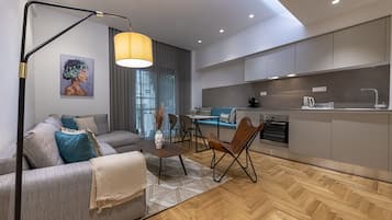 Luxury Apartment | Living area | 42-inch Smart TV with digital channels, TV