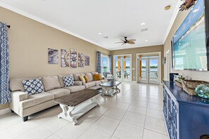 Comfort House, 4 Bedrooms, Balcony, Lagoon View | Living room | 60-inch Smart TV with cable channels, TV