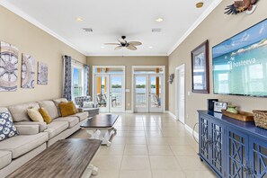 Comfort House, 4 Bedrooms, Balcony, Lagoon View | Living room | 60-inch Smart TV with cable channels, TV