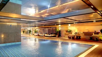 Indoor pool, open 6:00 AM to 7:00 PM, pool loungers