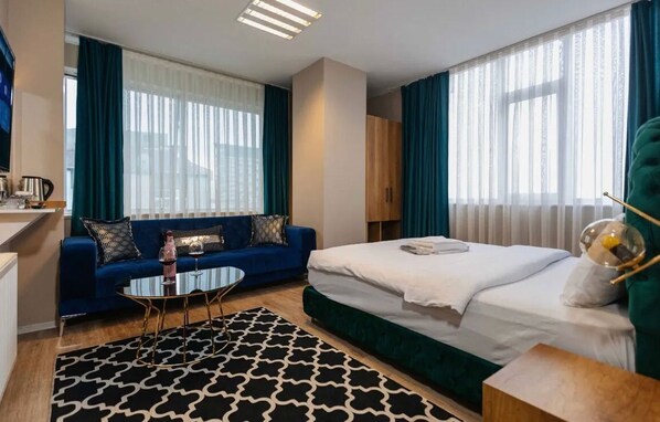 Habitación familiar | Escritorio, wifi gratis y ropa de cama