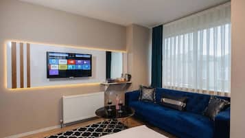 90-inch Smart TV with premium channels, TV