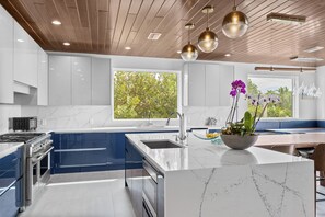Fridge, microwave, oven, stovetop - Contemporary Coastal Retreat w Gourmet Kitchen & Stunning Gulf Views by RVA (Longboat Key)