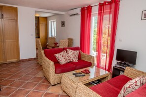 TV, DVD player, books, video library