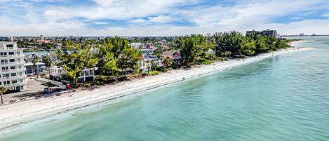 On the beach, sun-loungers, beach towels