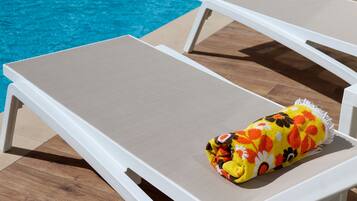 Outdoor pool, open 9:00 AM to 5:00 PM, sun loungers