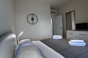 2 chambres, fer et planche à repasser, lit de bébé portatif, Wi-Fi