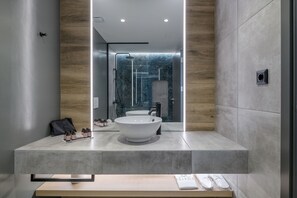 Acropolis Suite | Bathroom | Combined shower/tub, rainfall showerhead, hair dryer, slippers
