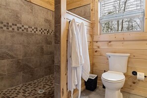 Combined shower/tub, hair dryer, towels, soap