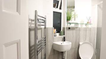 Shower, towels, soap, shampoo