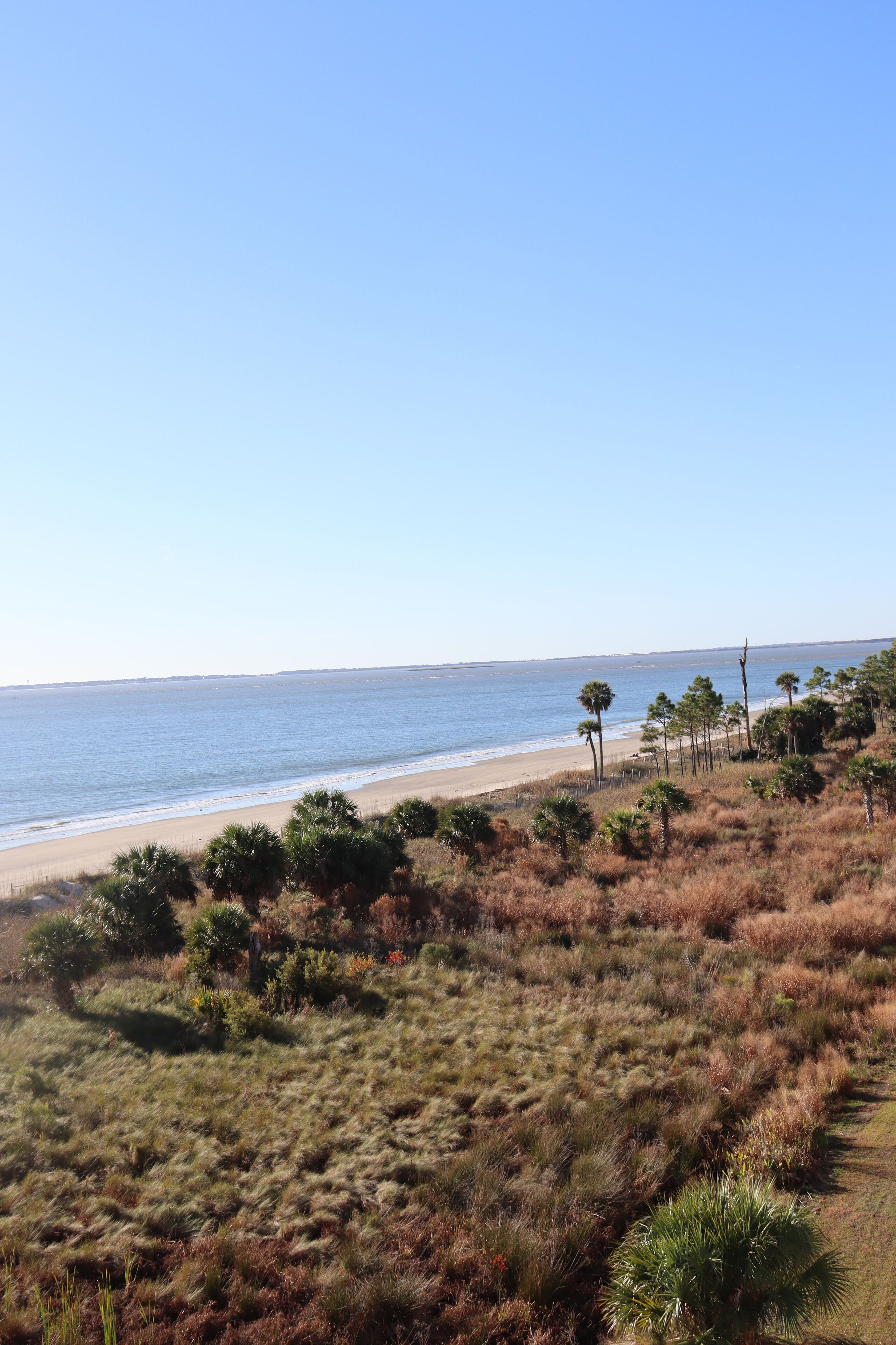 On the beach, sun loungers, beach towels