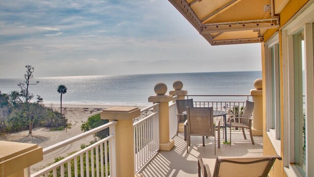 A balcony with a view of the beach and ocean. - Oceanfront Penthouse Overlooking the Atlantic Ocean (Daufuskie Island)