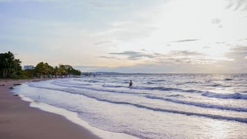On the beach, white sand