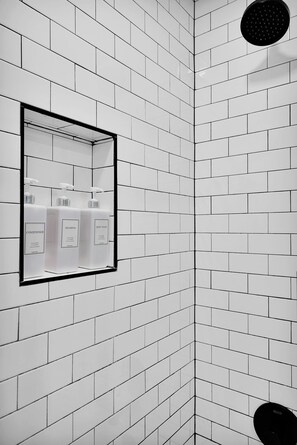 Combined shower/tub, hair dryer, towels, soap