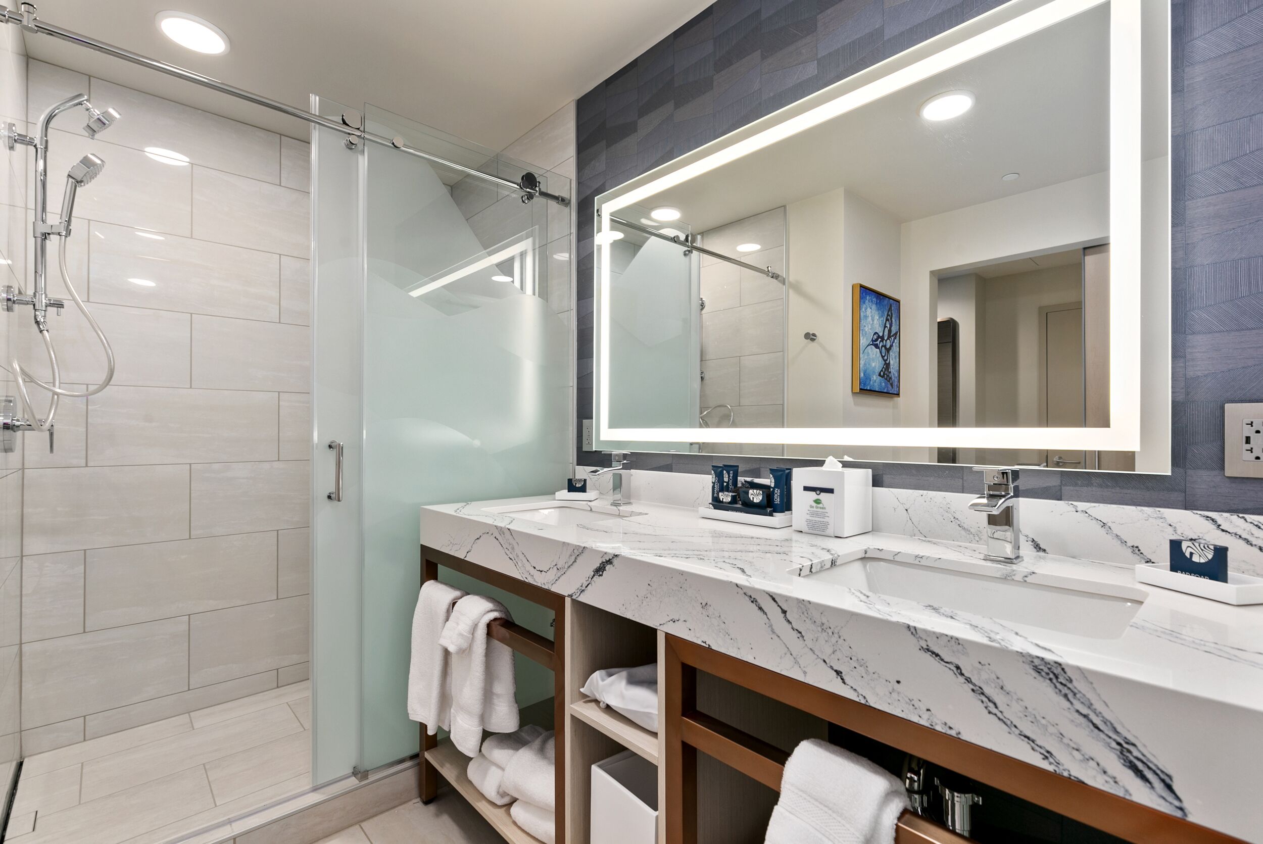 Designer toiletries, hair dryer, towels, soap