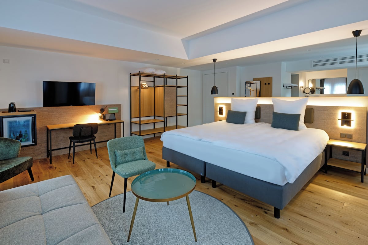 Chambre Exécutive | Literie hypoallergénique, articles gratuits dans le mini-bar