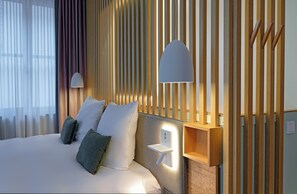 Deluxe tweepersoonskamer | Hypoallergeen beddengoed, een gratis minibar, een kluis op de kamer