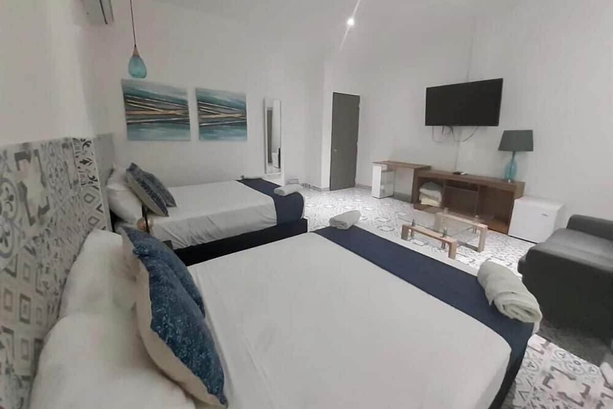 Premium bedding, pillow-top beds, in-room safe, blackout curtains