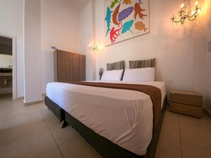 Premium bedding, pillow-top beds, in-room safe, blackout curtains - Aw Hotel Holidays Palace (San Andrés)