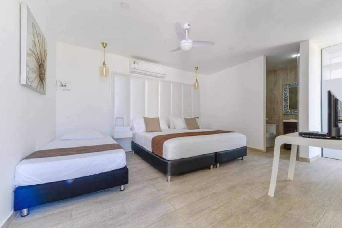 Premium bedding, pillow-top beds, in-room safe, blackout curtains