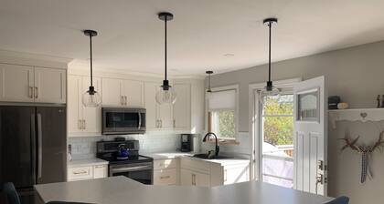 Cozy open concept home, walking distance to Canada Games grounds