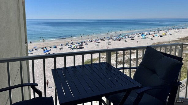 A balcony with a view of a beach. - 🏖️ Wild and free just like the sea🌴 (Gulf Shores)