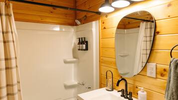 Combined shower/bathtub, hair dryer, towels, soap