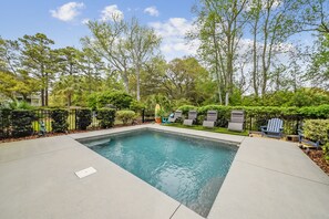 Outdoor pool, a heated pool - Picturesque home- 7 min walk from the beach with private pool and elevator. (Hilton Head Island)