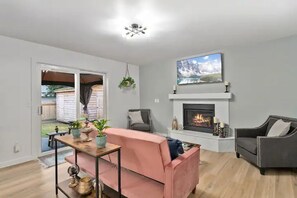 Smart TV, fireplace, books