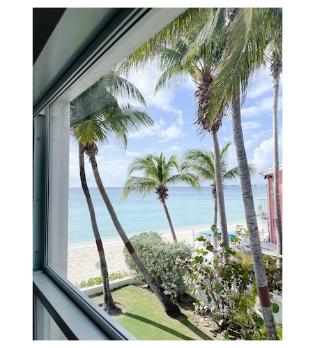 Luxury Designer Seven Mile Beachfront Condo Townhouse -Direct Walk-out to Beach!