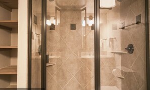 Combined shower/tub, hair dryer, soap, shampoo