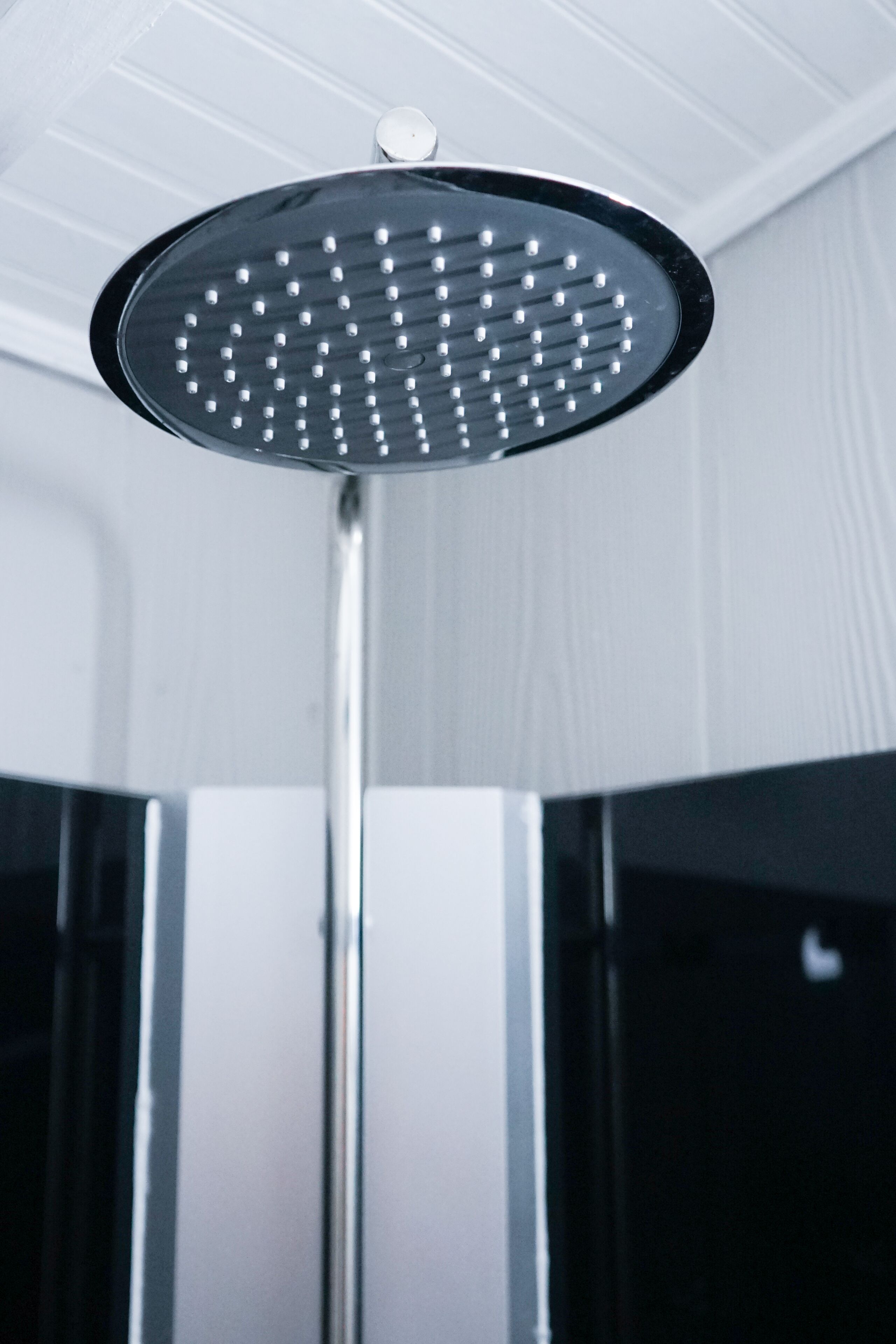 A showerhead with multiple round nozzles.