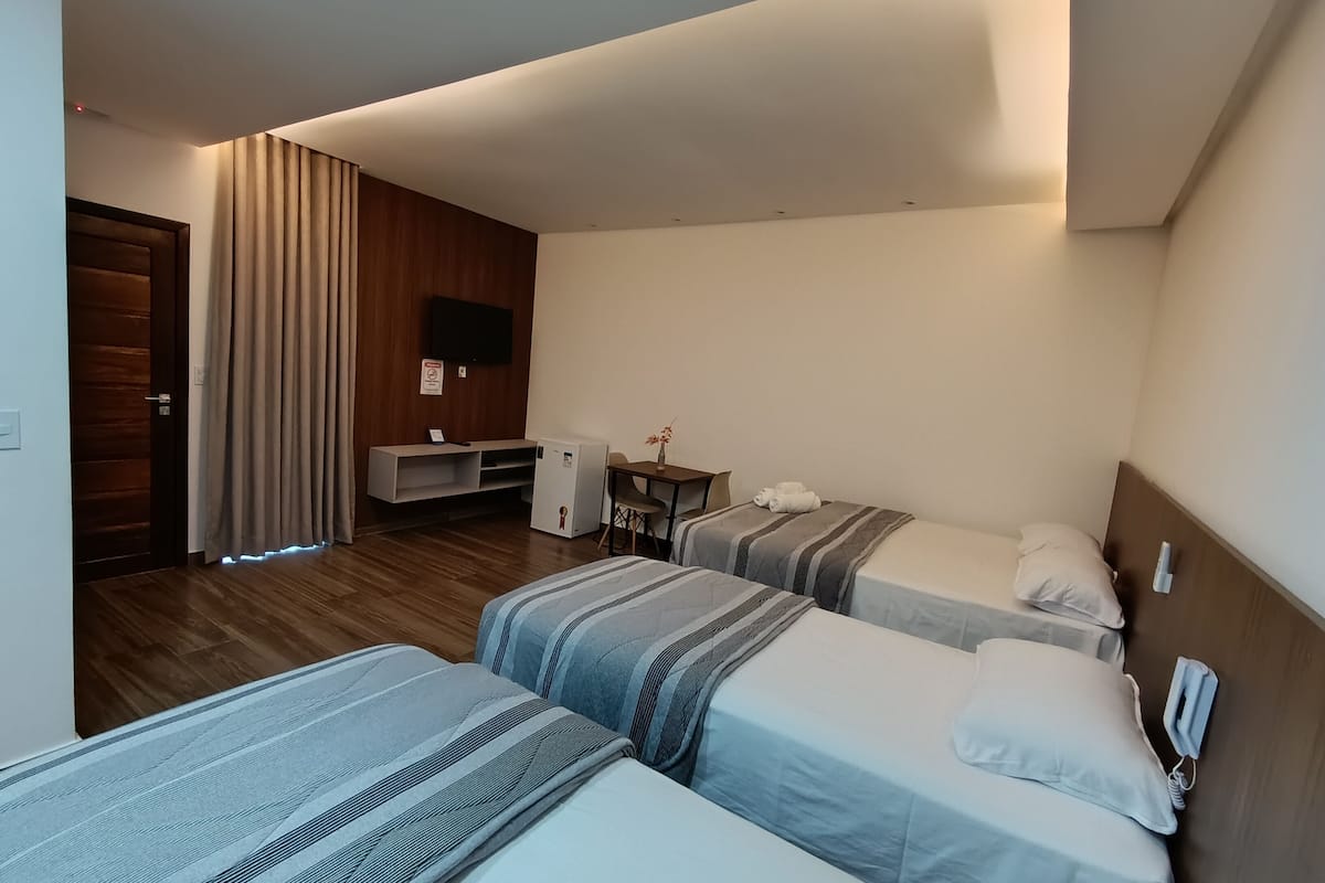 Quadrupla Comfort | Biancheria da letto di alta qualità, materassi Select Comfort, minibar